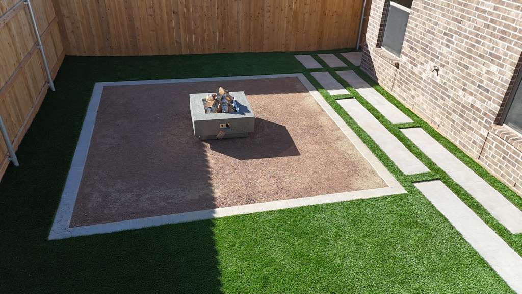Artificial turf backyard with decomposed-granite fire-pit court and square gas fire pit in Deer Meadows, Odessa TX